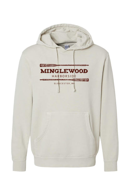 Pigment-dyed cream hooded sweatshirt with Minglewood Harborside oars graphic, front pouch pocket, and cotton blend.