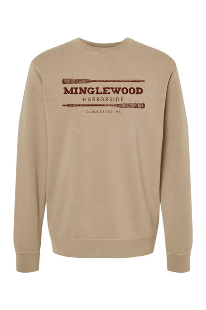 Tan pigment-dyed crewneck sweatshirt with Minglewood Harborside graphic and oar illustrations in dark brown.
