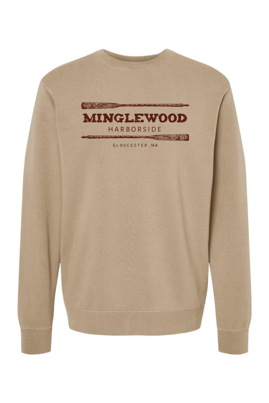 Tan pigment-dyed crewneck sweatshirt with Minglewood Harborside graphic and oar illustrations in dark brown.