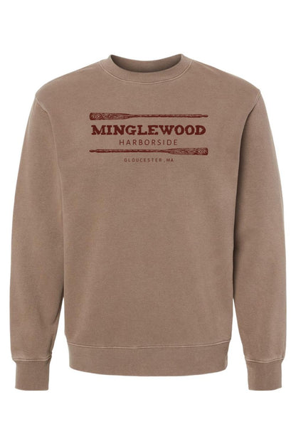 Brown pigment-dyed crewneck sweatshirt with Minglewood Harborside graphic featuring oars and Gloucester, MA text.