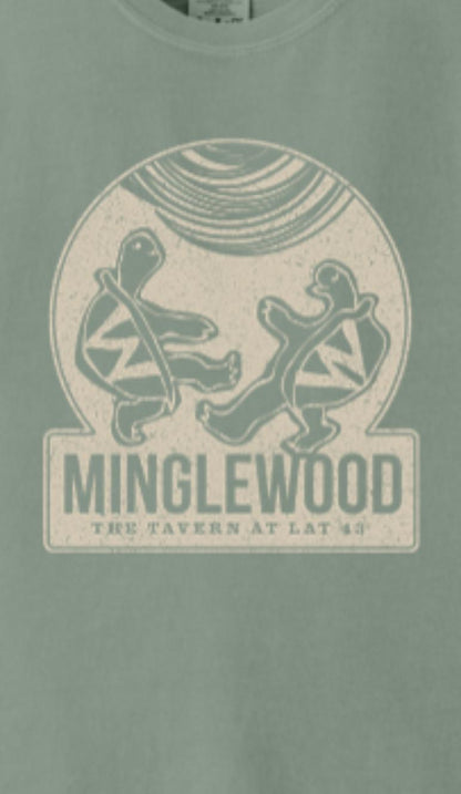 Sage green Comfort Colors cotton t-shirt featuring a vintage Minglewood tavern graphic with dancing turtles.