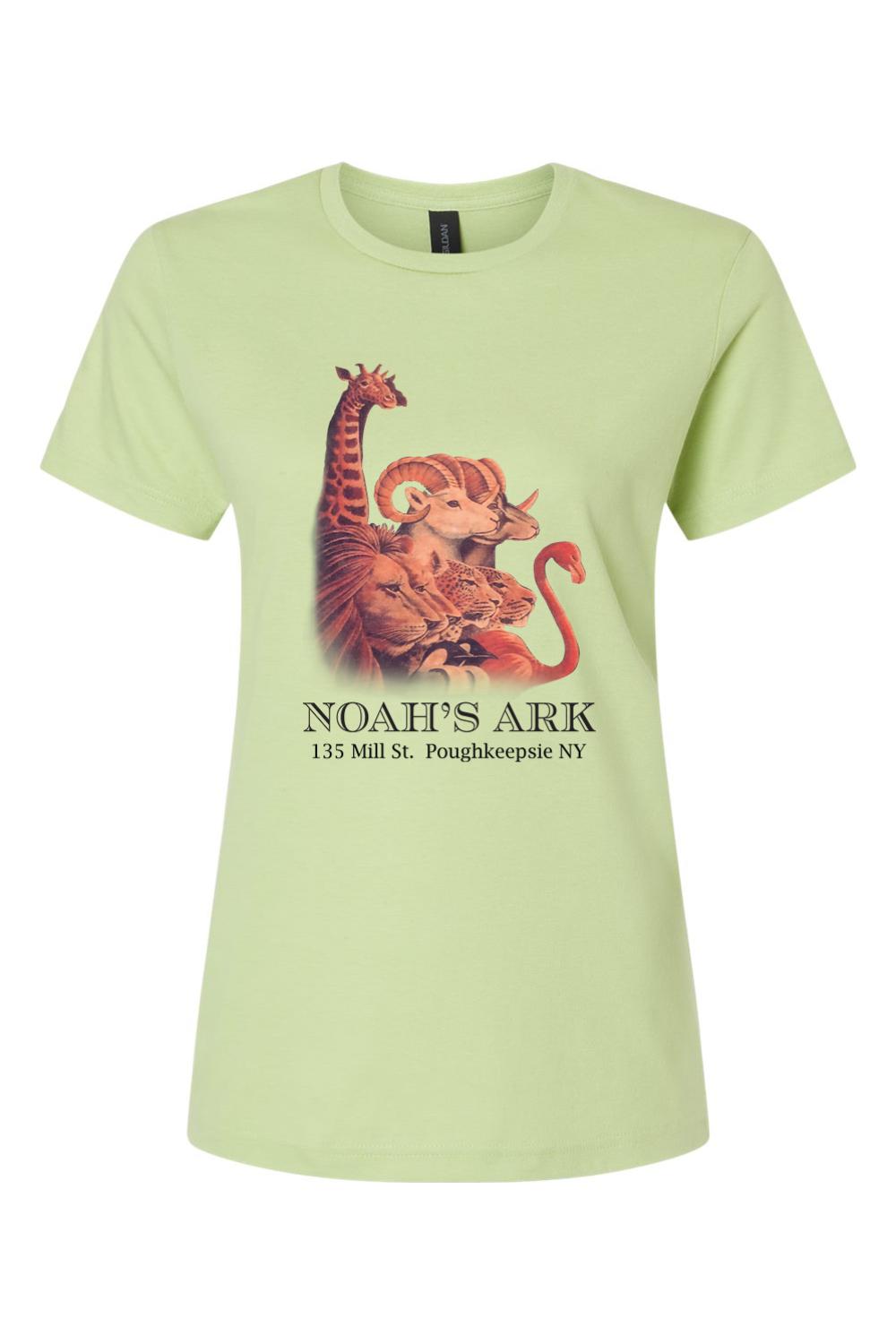 Light green women's cotton tee featuring a colorful Noah's Ark animal graphic and text on the front.