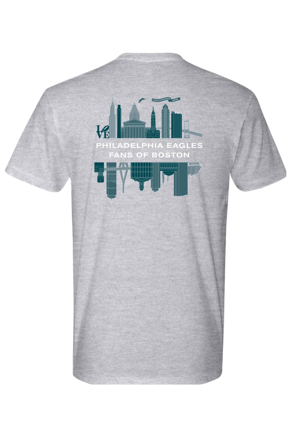 Grey cotton t-shirt featuring a teal Philadelphia and Boston skyline graphic with Philadelphia Eagles Fans of Boston text.
