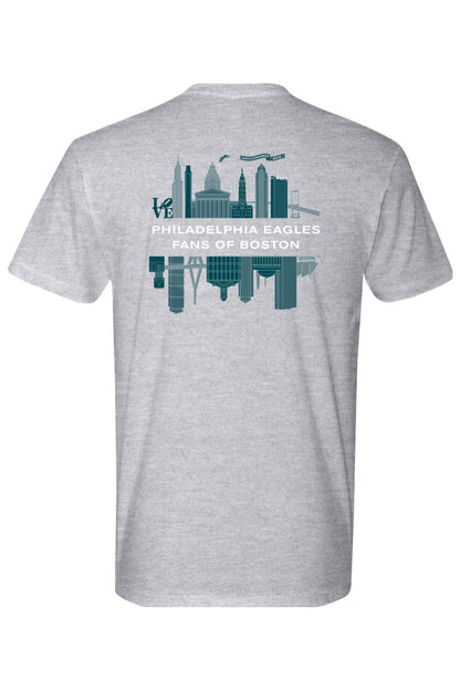 Grey cotton t-shirt featuring a teal Philadelphia and Boston skyline graphic with Philadelphia Eagles Fans of Boston text.