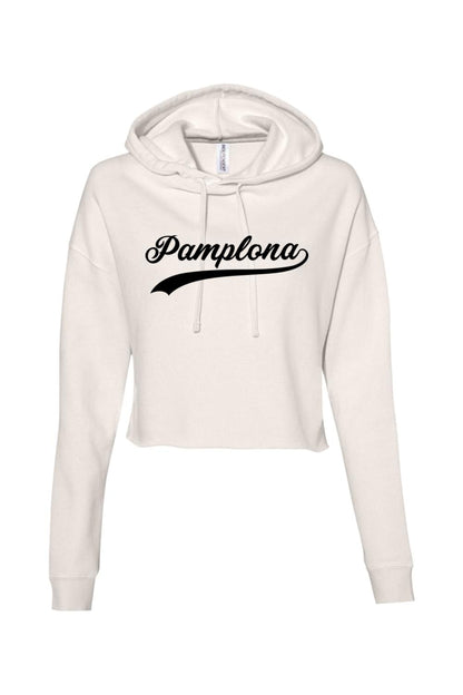 Off-white cropped athletic hoodie with a black Pamplona script logo, drawstring hood, and soft cotton-blend fabric.