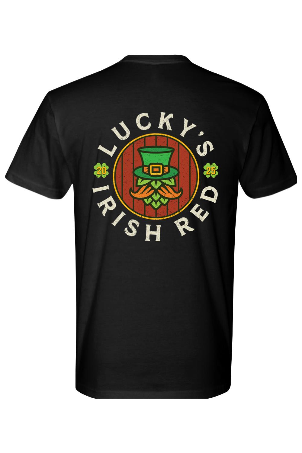 Black men's t-shirt featuring a Lucky's Irish Red graphic with a leprechaun hop character and 2025 clover accents.