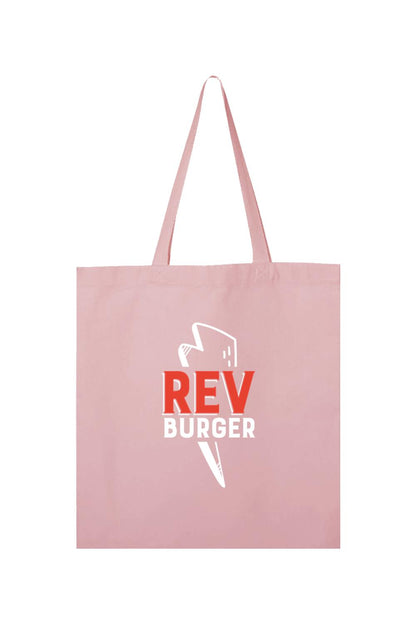 Light pink heavy cotton canvas tote bag featuring a white and red Rev Burger logo graphic and long shoulder straps.