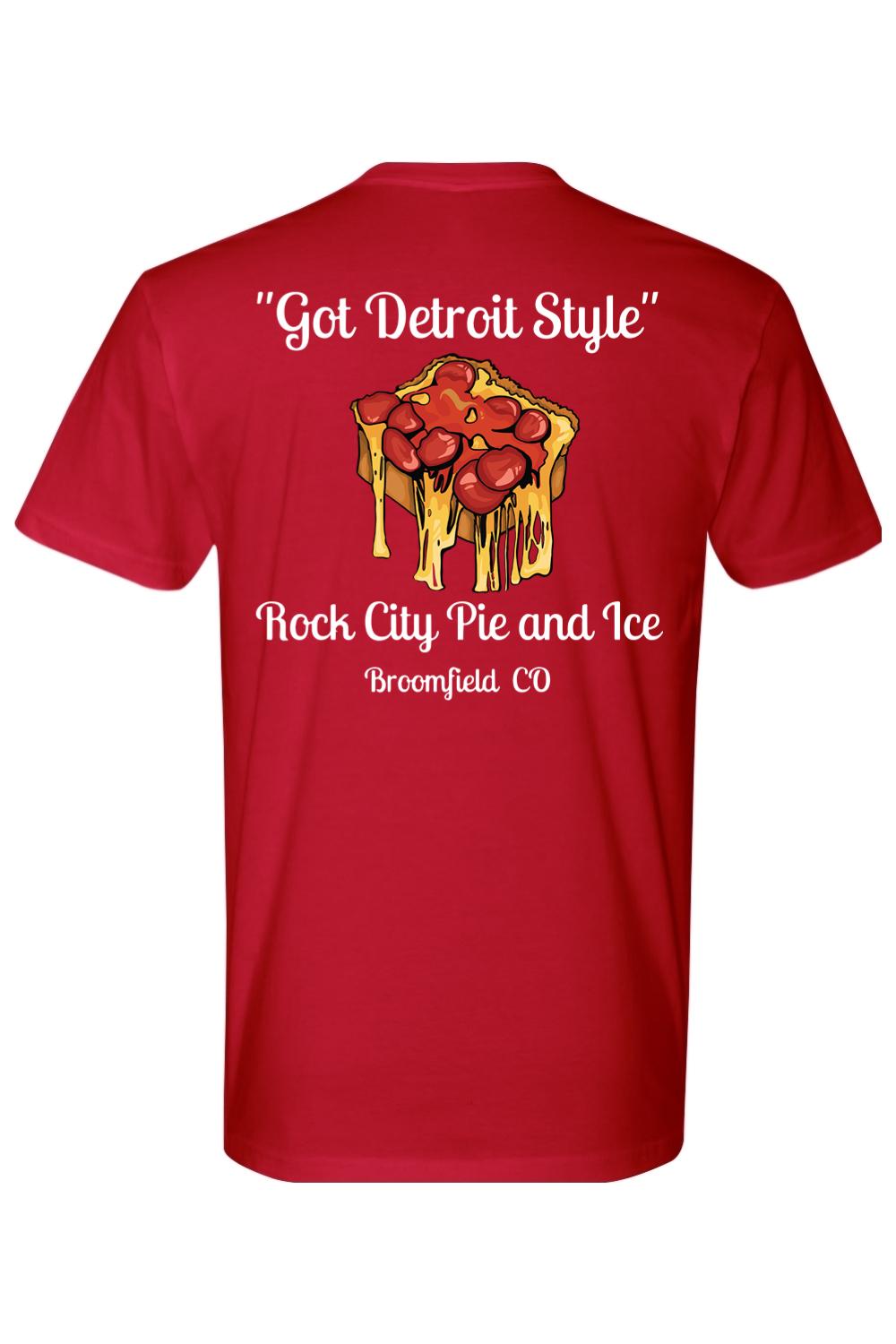 Red cotton crew neck tee featuring a Detroit-style pizza graphic with text on the back.