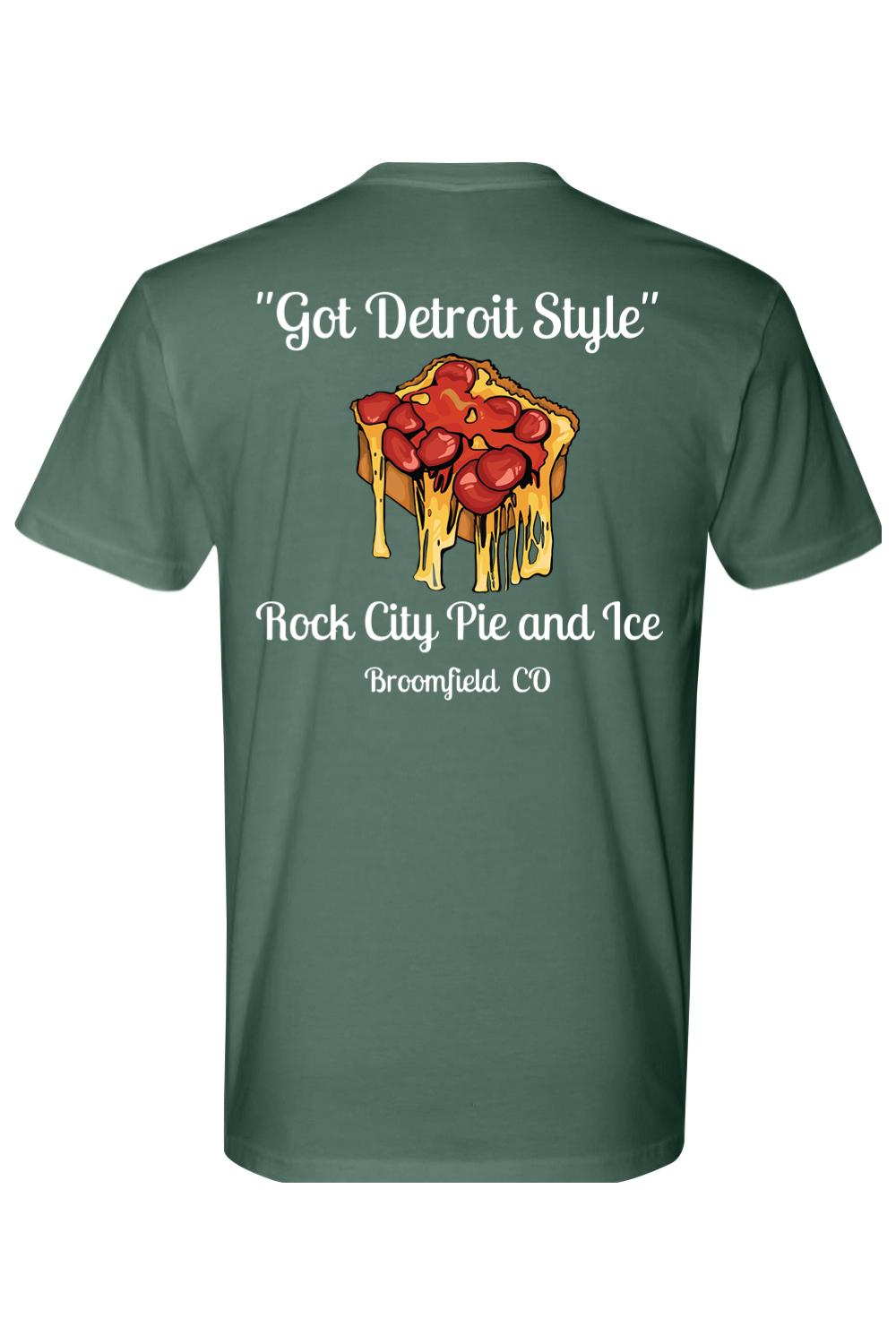 Dark green cotton crew neck tee featuring a Detroit-style pizza graphic and Rock City Pie and Ice text on the back.