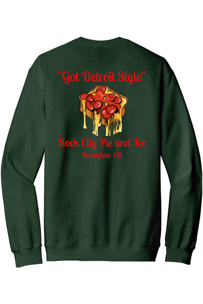 Dark green crewneck sweatshirt featuring a Detroit-style pizza graphic with red text on the back.