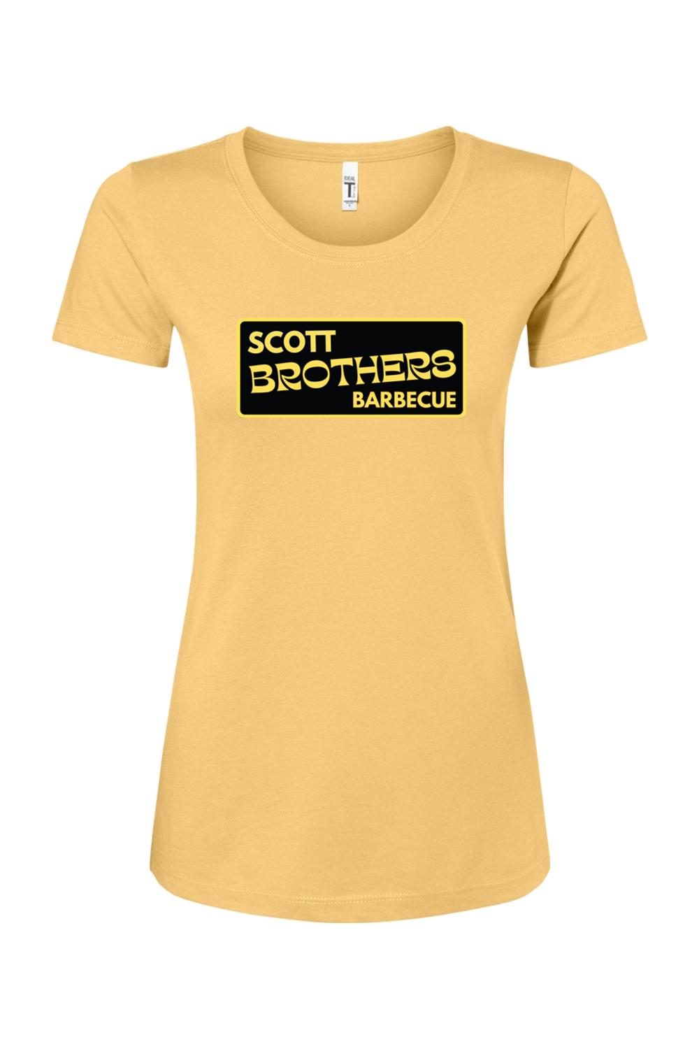 Women's gold cotton-blend t-shirt featuring a black and gold Scott Brothers Barbecue logo on the chest.