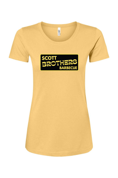 Women's gold cotton-blend t-shirt featuring a black and gold Scott Brothers Barbecue logo on the chest.