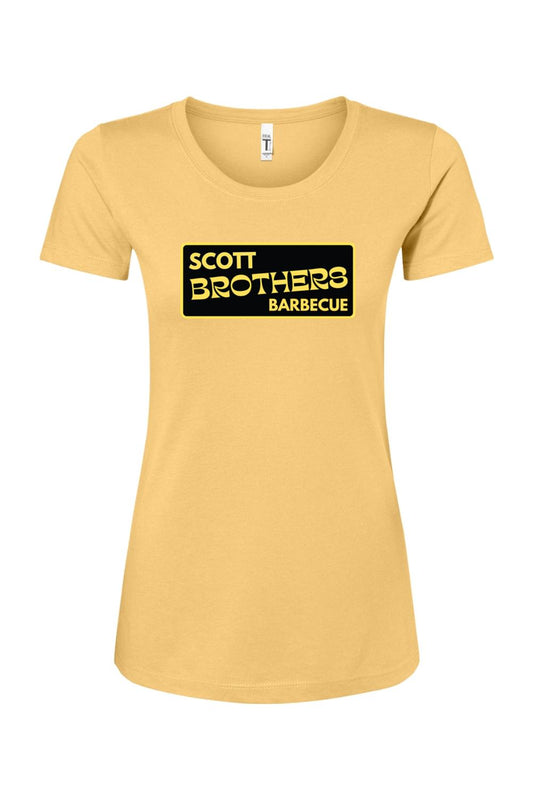 Women's gold cotton-blend t-shirt featuring a black and gold Scott Brothers Barbecue logo on the chest.
