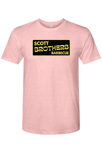 Soft pink triblend t-shirt featuring a black and gold Scott Brothers Barbecue logo on the chest.