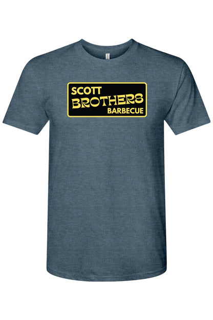 Heather blue triblend t-shirt featuring a black and gold Scott Brothers Barbecue logo on the chest.