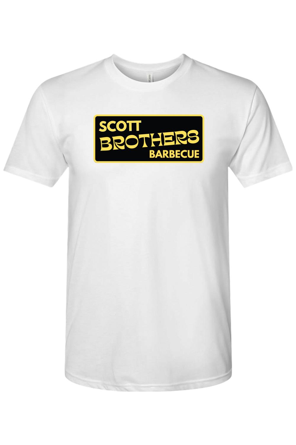 White triblend crewneck t-shirt featuring a black rectangular Scott Brothers Barbecue logo with gold lettering.