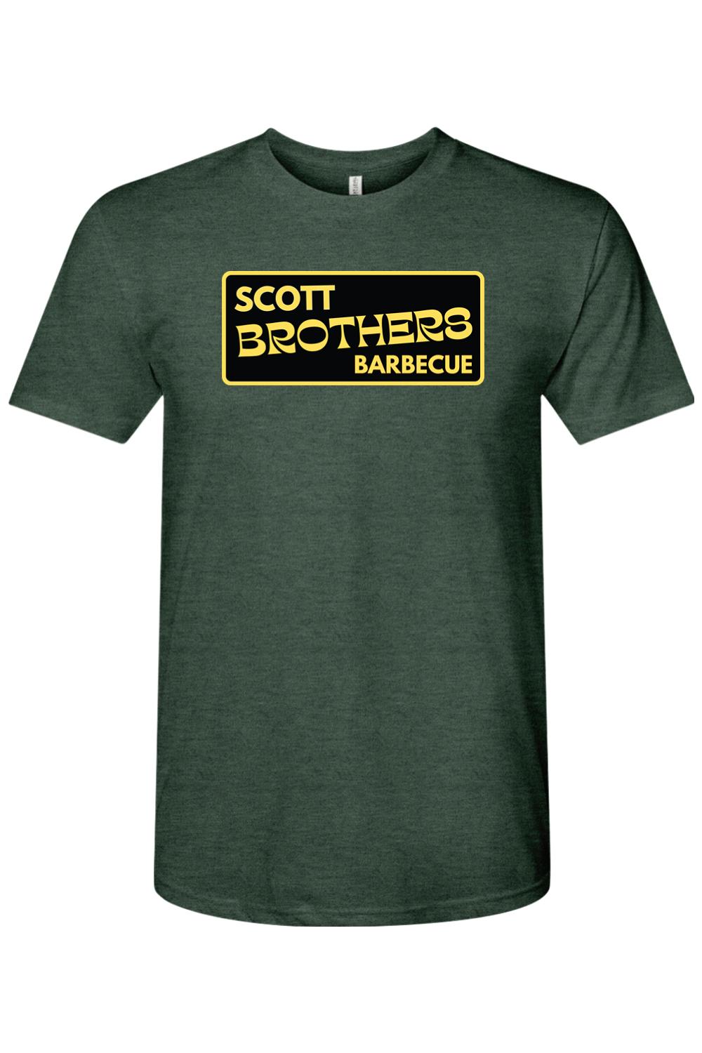 Dark green triblend crewneck t-shirt featuring a black and gold Scott Brothers Barbecue logo graphic on the chest.