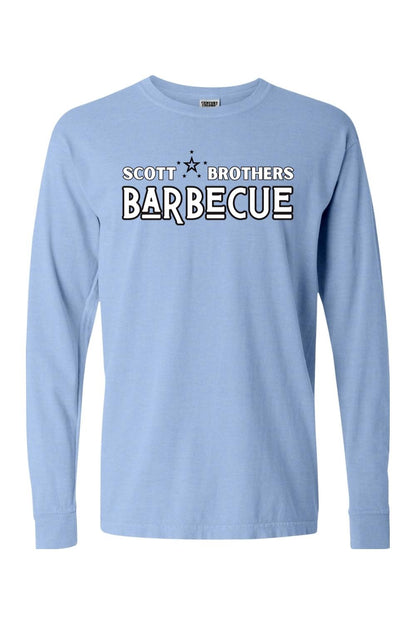 Light blue Comfort Colors long sleeve t-shirt with a black and white Scott Brothers Barbecue logo on the chest.