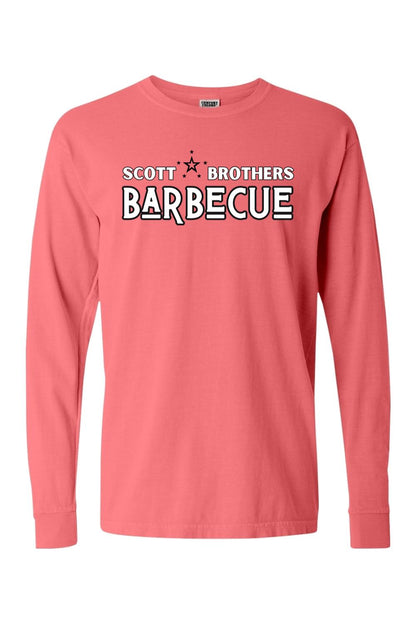 Coral long sleeve Comfort Colors t-shirt featuring a black and white Scott Brothers Barbecue logo on the chest.
