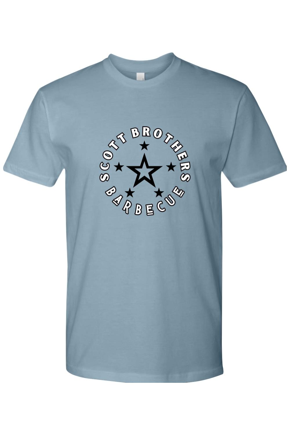 Light blue cotton t-shirt featuring a black and white circular Scott Brothers Barbecue star logo on the chest.