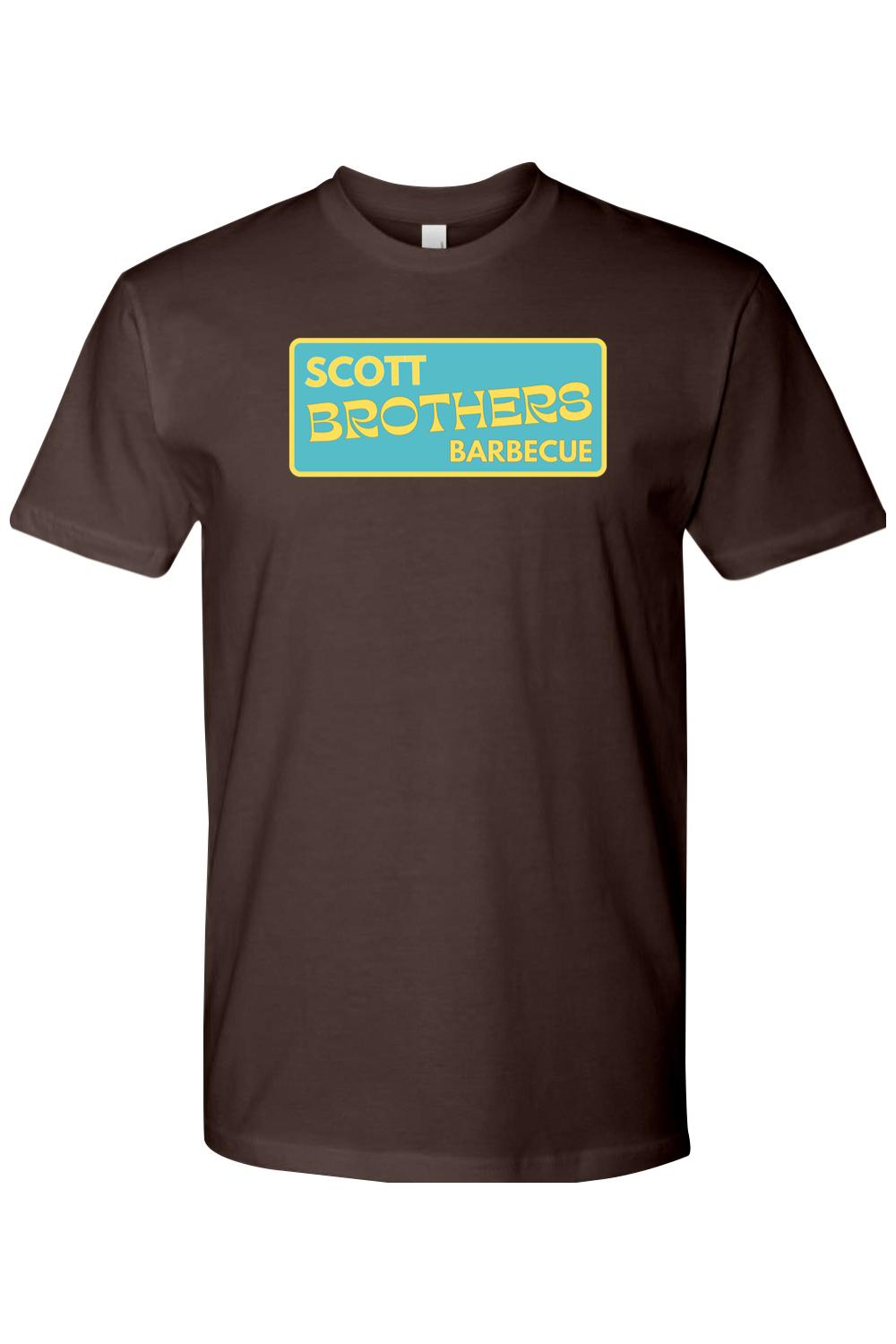 Brown cotton t-shirt featuring a rectangular teal logo with yellow Scott Brothers Barbecue text.
