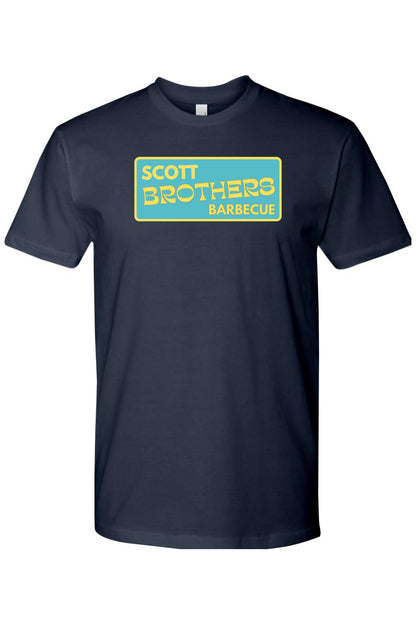 Navy blue cotton t-shirt featuring a yellow and teal Scott Brothers Barbecue logo graphic on the chest.