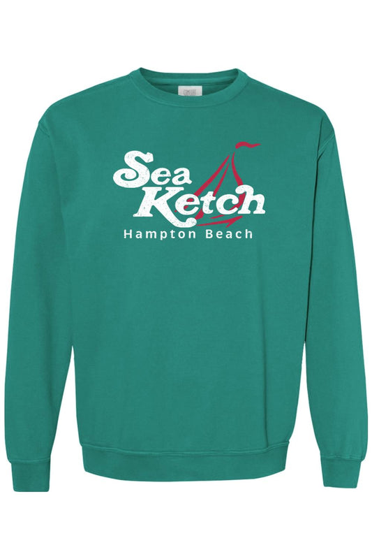 Teal Comfort Colors crewneck sweatshirt featuring a white Sea Ketch Hampton Beach graphic with a red sailboat icon.
