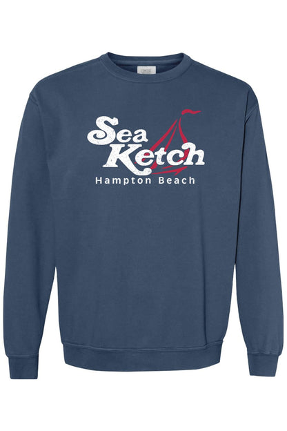 Blue Comfort Colors crewneck sweatshirt featuring a white Sea Ketch Hampton Beach graphic with a red sailboat design.