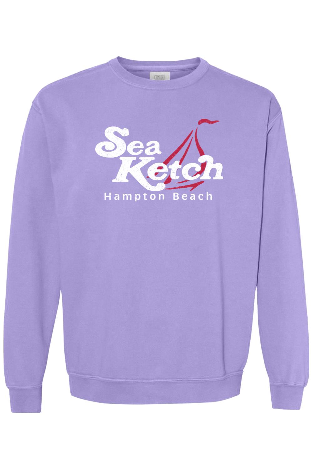 Light purple Comfort Colors crewneck sweatshirt featuring a white Sea Ketch Hampton Beach graphic with a red sailboat.