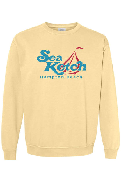 Light yellow Comfort Colors crewneck sweatshirt featuring a blue and red Sea Ketch Hampton Beach sailboat graphic.