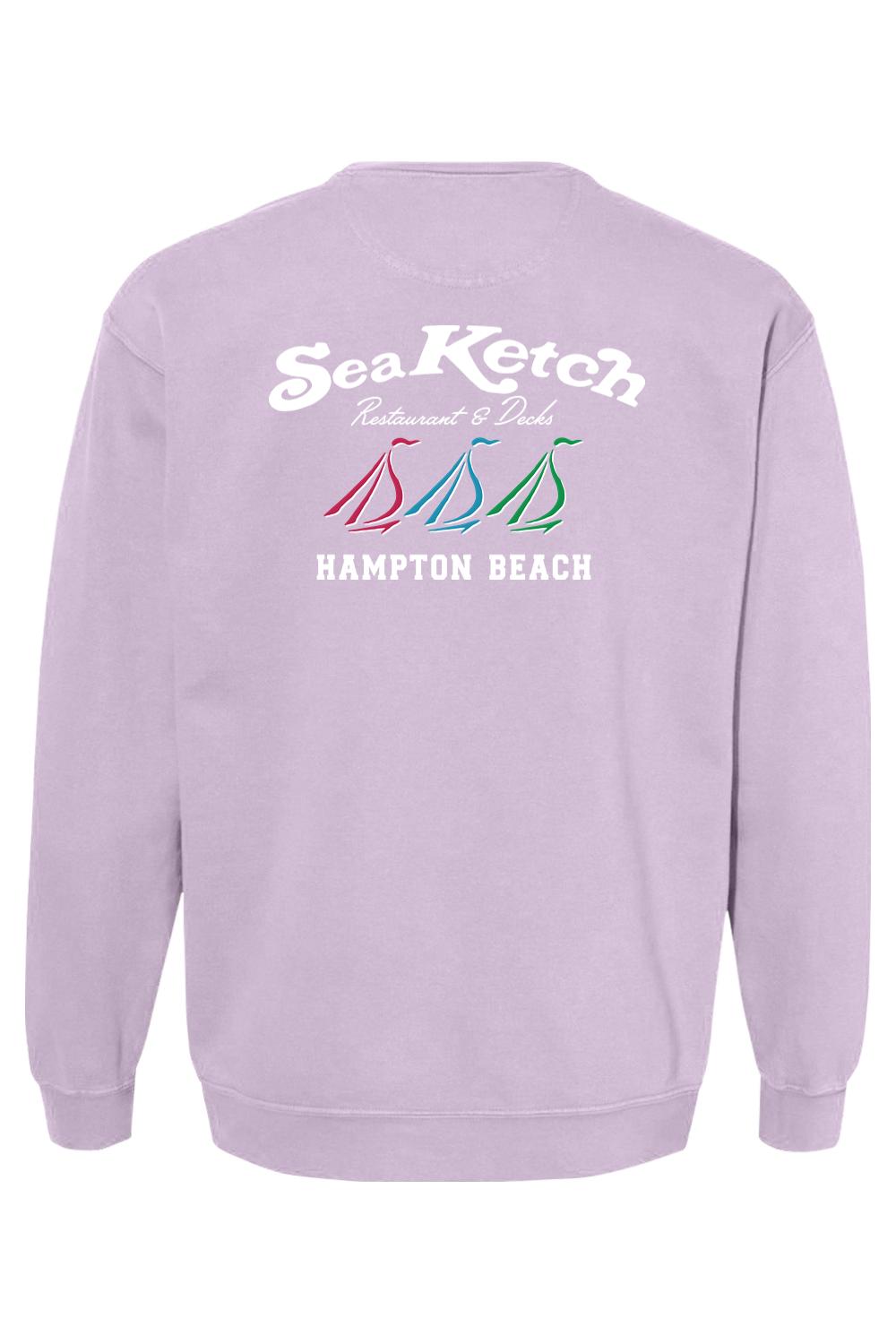 Light purple Comfort Colors crewneck sweatshirt featuring a Sea Ketch Hampton Beach tri-sail graphic on the back.