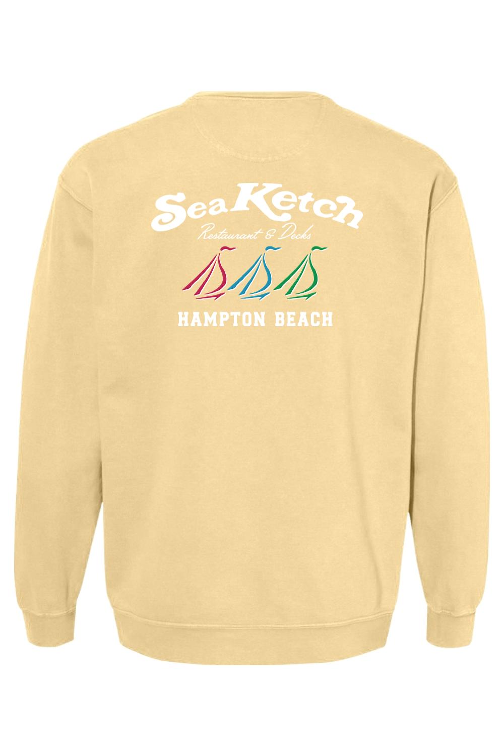 Light yellow Comfort Colors crewneck sweatshirt featuring a Sea Ketch tri-sail nautical graphic on the back.