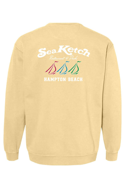 Light yellow Comfort Colors crewneck sweatshirt featuring a Sea Ketch tri-sail nautical graphic on the back.