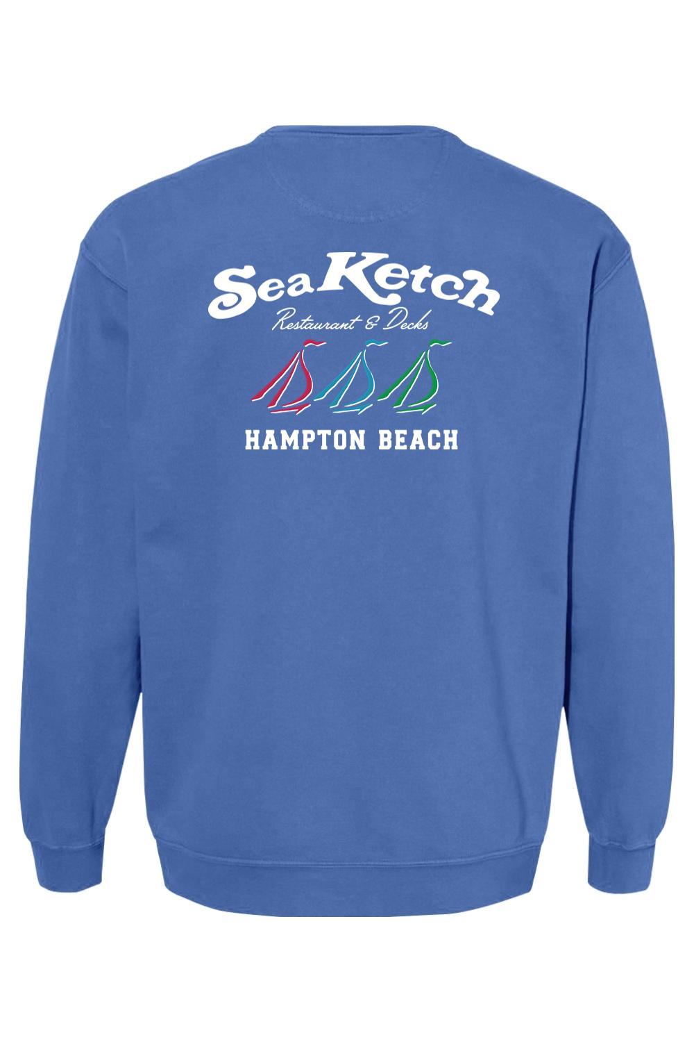 Blue Comfort Colors crewneck sweatshirt featuring a Sea Ketch Hampton Beach tri-sail graphic on the back.