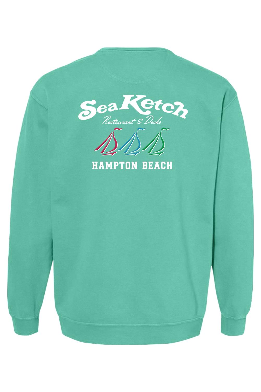 Mint green Comfort Colors crewneck sweatshirt featuring a Sea Ketch Hampton Beach tri-sail graphic on the back.
