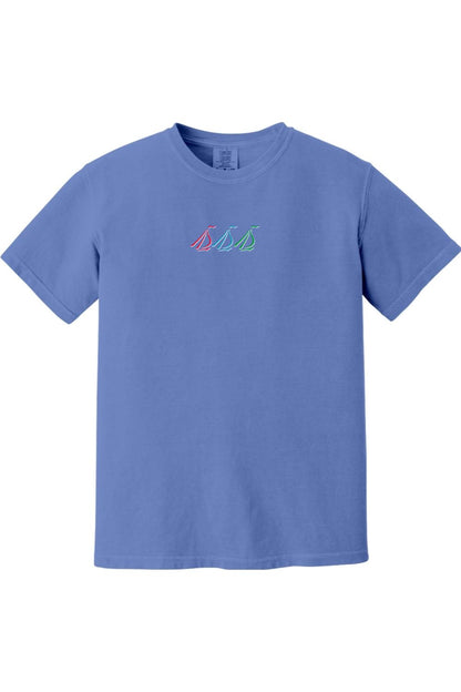 Periwinkle blue Comfort Colors short-sleeve t-shirt featuring a small, colorful tri-sail nautical graphic on the chest.