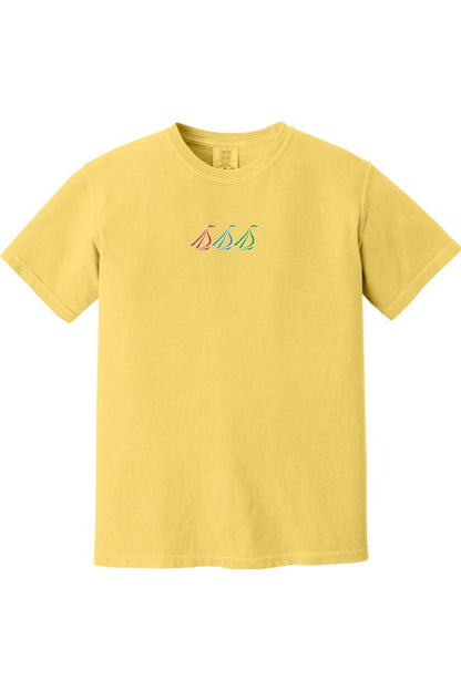 Yellow Comfort Colors crewneck t-shirt featuring a small, colorful tri-sail nautical graphic on the chest.