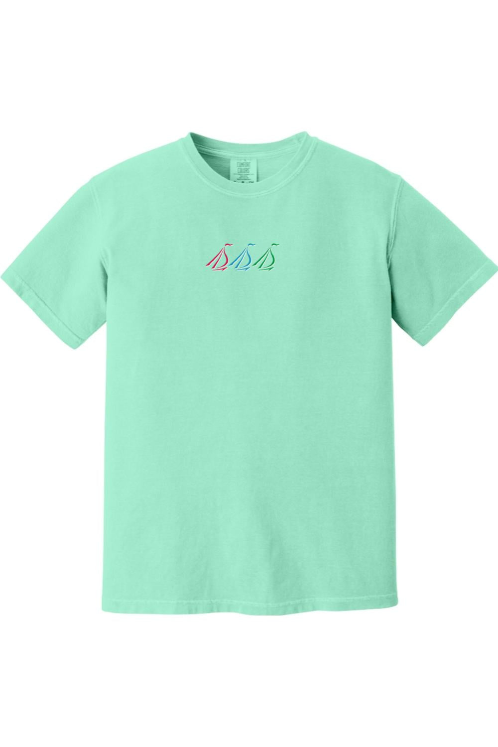 Mint green Comfort Colors t-shirt featuring a small, colorful tri-sail nautical graphic on the chest.