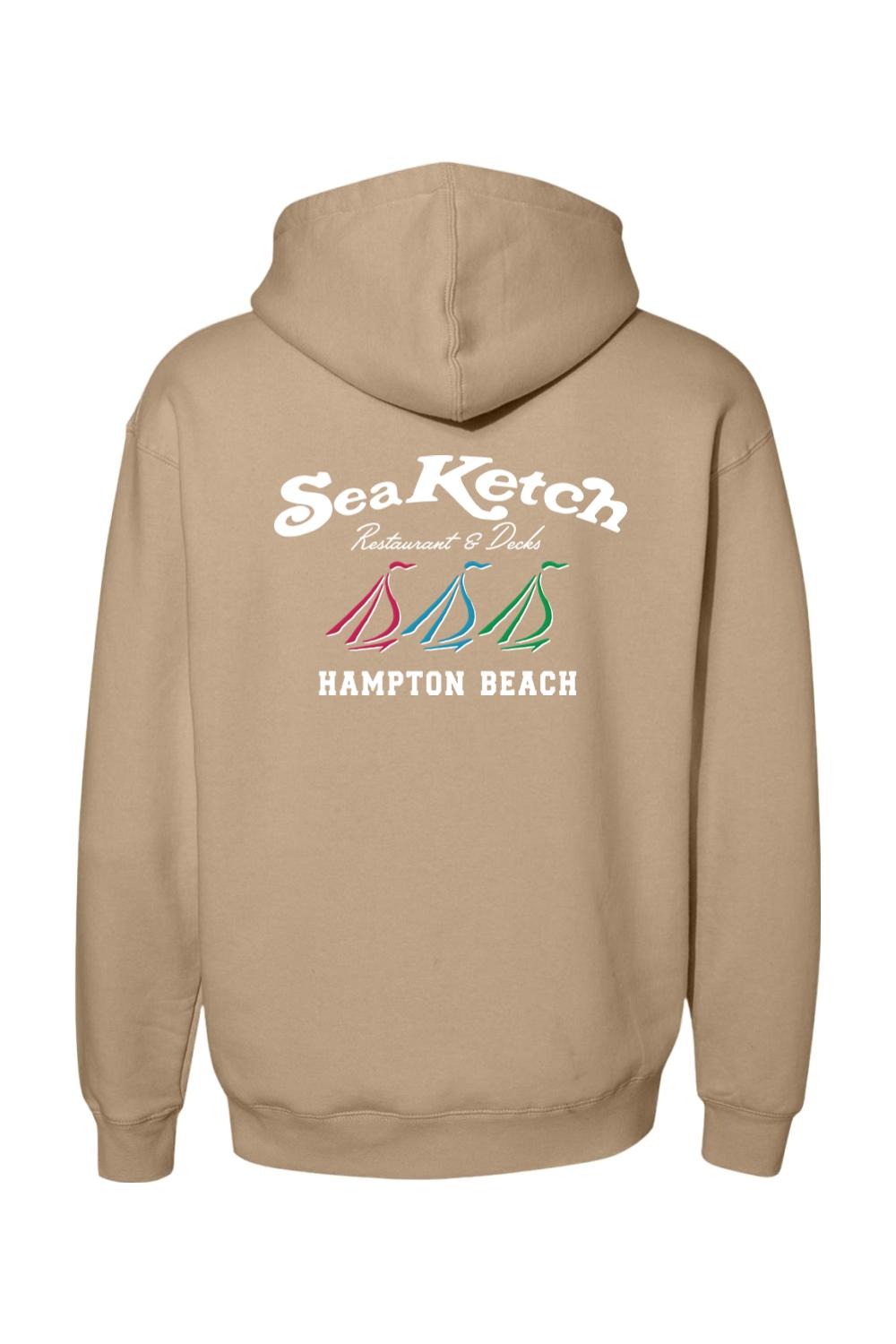 Tan heavyweight hoodie featuring a Sea Ketch Hampton Beach logo with three colorful sailboat icons on the back.