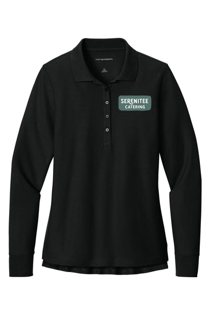 Black women's long sleeve polo shirt with a button placket and Serenitee Catering logo on the chest.