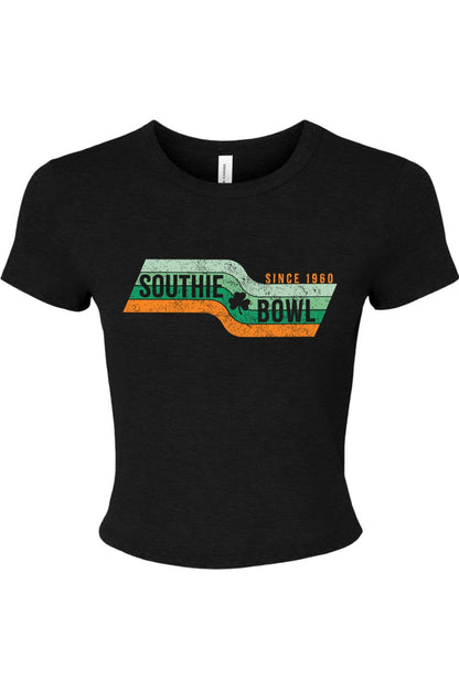 Black ribbed women's baby tee featuring a vintage Southie Bowl Represent graphic with a clover and orange stripes.