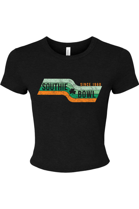 Black ribbed women's baby tee featuring a vintage Southie Bowl Represent graphic with a clover and orange stripes.