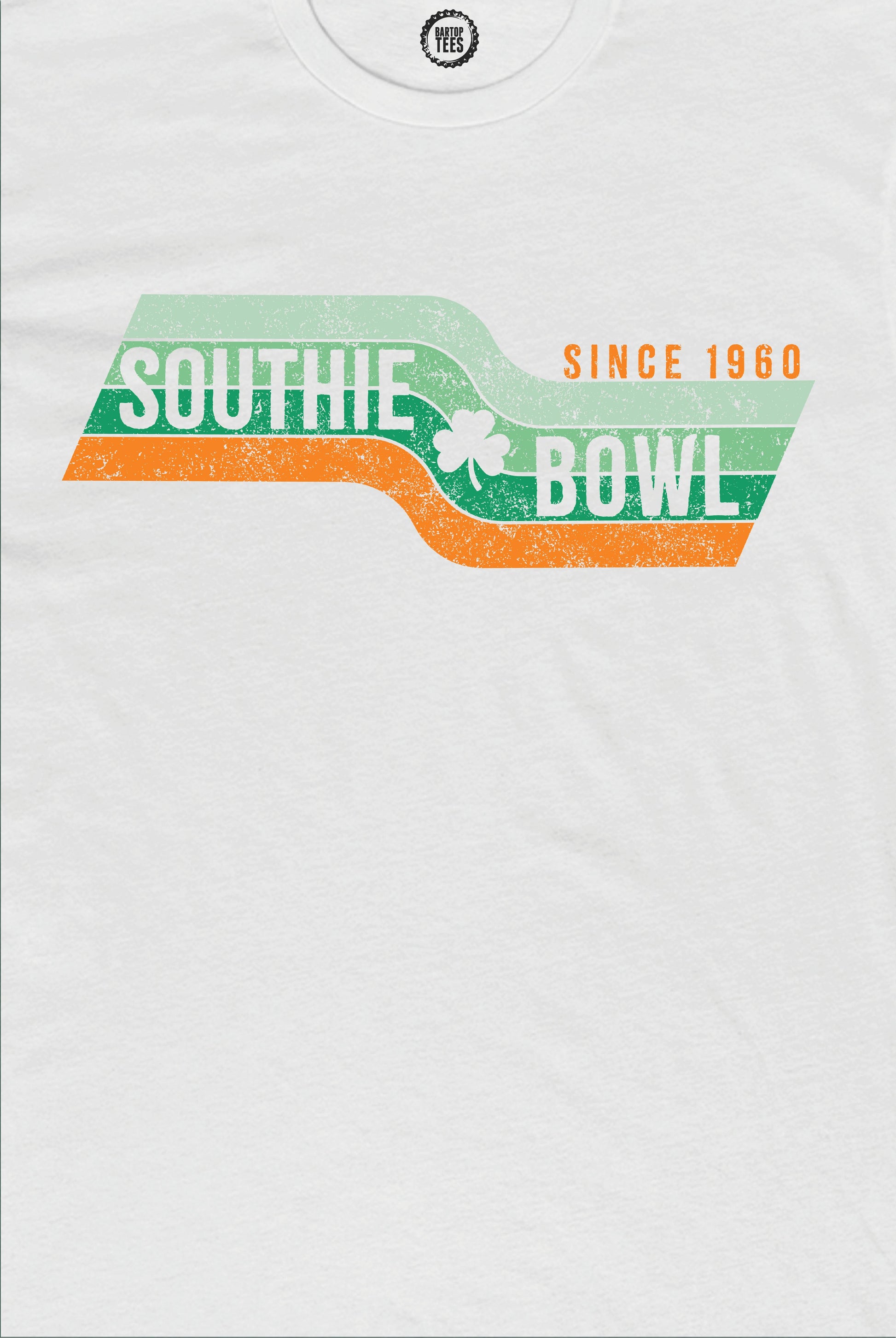 White cotton crewneck tee featuring a vintage Southie Bowl graphic with green and orange stripes and a shamrock.
