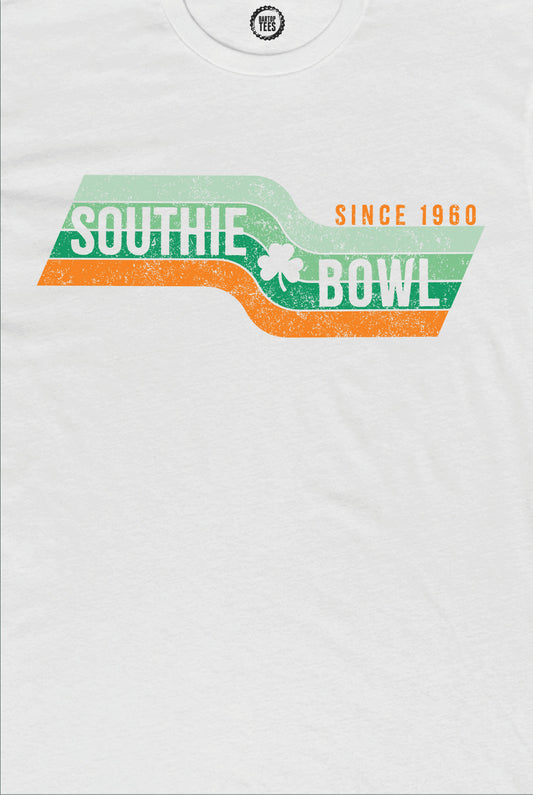 White cotton crewneck tee featuring a vintage Southie Bowl graphic with green and orange stripes and a shamrock.