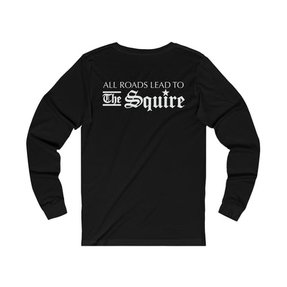 Black long-sleeve jersey tee featuring white All Roads Lead to The Squire text on the back.