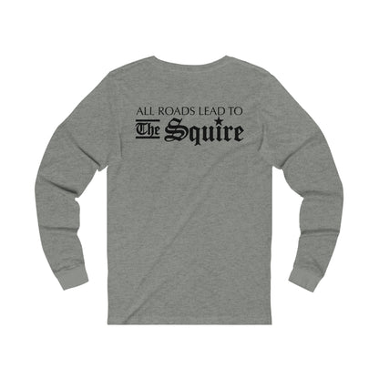 Grey long-sleeve jersey tee with All Roads Lead to The Squire printed in black on the back.