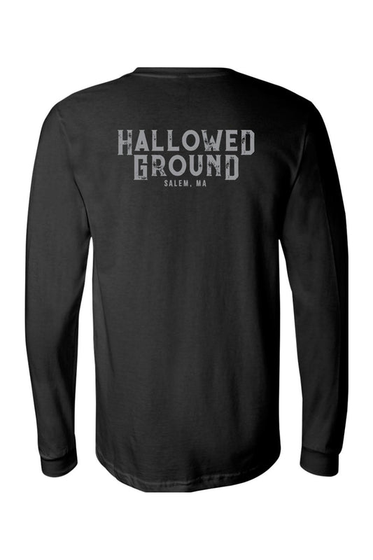 Black long sleeve cotton t-shirt featuring a distressed white Hallowed Ground Salem, MA graphic on the back.
