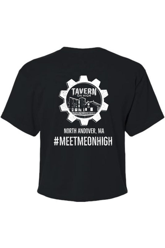 Black cotton women's cropped tee featuring a white Tavern on High gear logo and #MEETMEONHIGH text graphic.