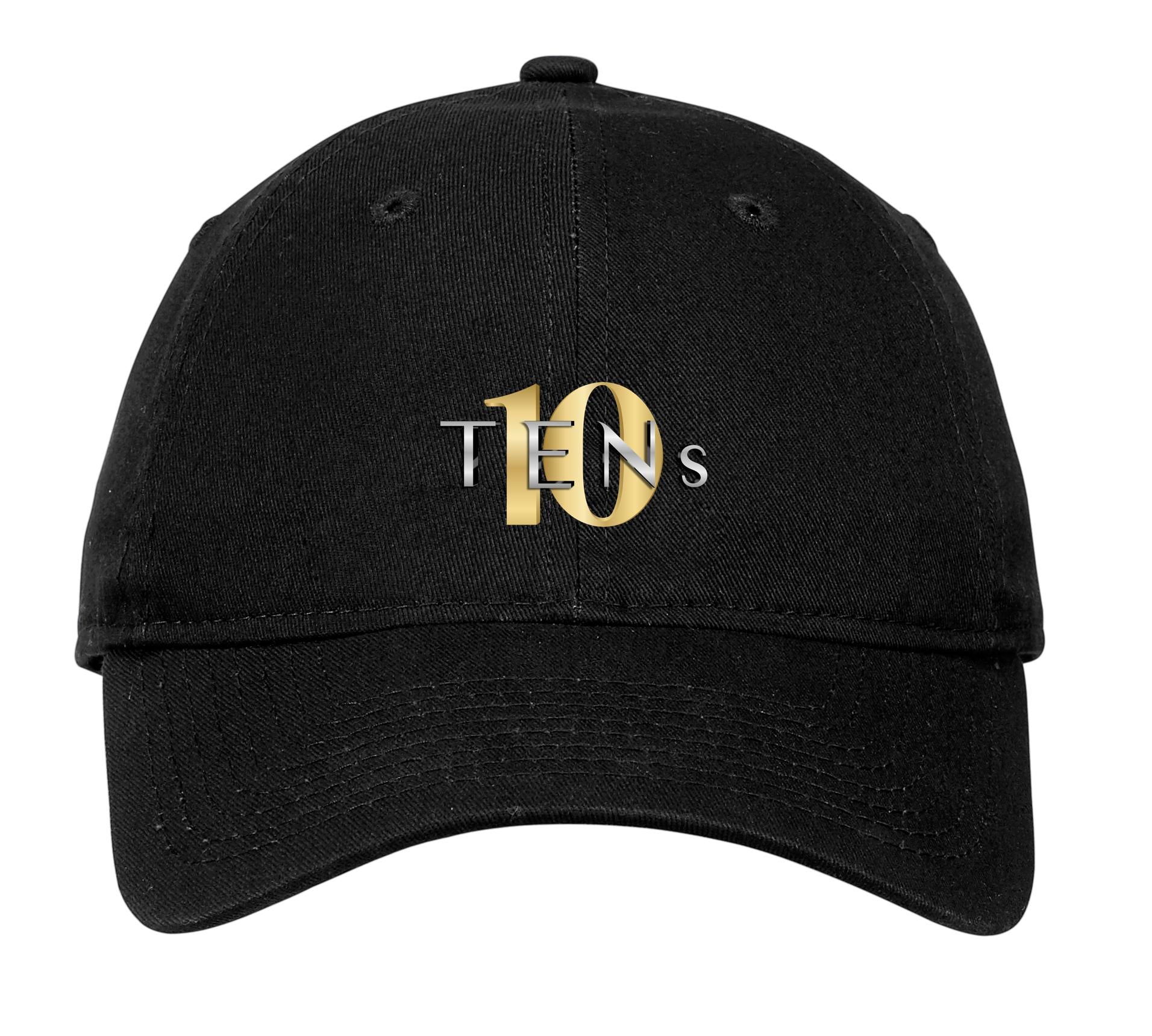 Black unstructured cotton baseball cap with a gold and silver Tens Show Club logo on the front.