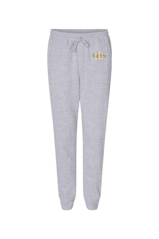 Light grey midweight cotton joggers with a drawstring waist and gold Tens Show Club logo on the hip.